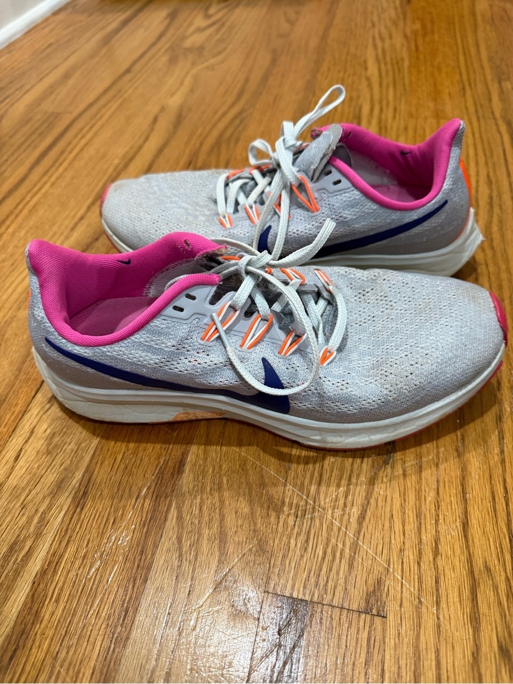 Nike Light Gray Running Shoes with Pink Lining and Navy Swoosh